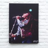 Canvas doek met print van een foto van Bob Marley tijdens een van zijn live optredens